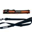 Dog Leash and Collar Set - Black Dog Collar with bold Orange Stripe with solid black adjustable leash in medium - against solid white background - Wag Trendz