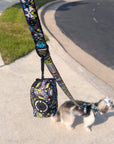 Adjustable Dog Leash - Medium - Skull Society with multicolored graphics in yellow, blue, purple with black background - attached to a leash and dog outdoors - Wag Trendz