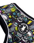 No Pull Dog Harness - Skull Society with multicolored graphics in yellow, blue, purple with black background - closeup - against solid white background - Wag Trendz