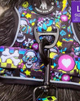 No Pull Dog Harness with Handle - Australian Cattle Dog wearing Skull Society harness with multicolored graphics in yellow, blue, purple with black background - against solid white background - Wag Trendz