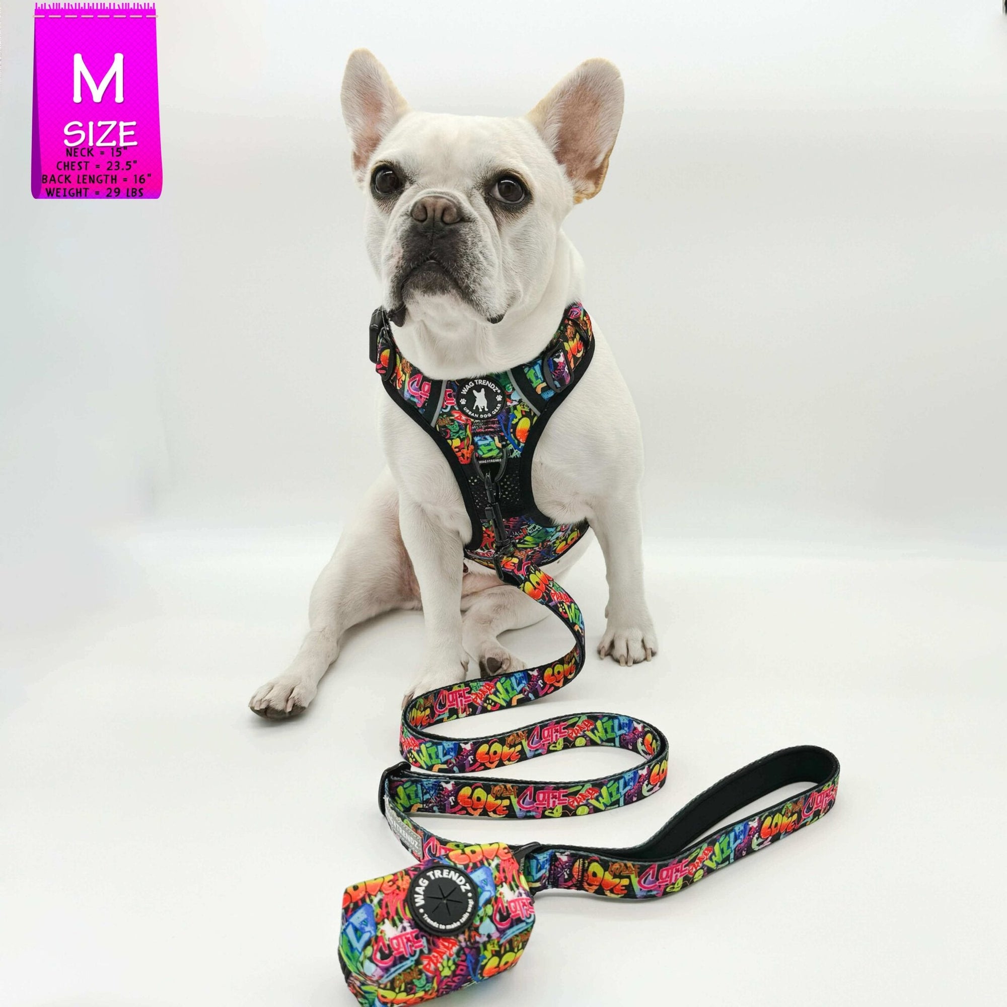 No Pull Dog Harness - with handle - French Bulldog wearing a medium multi colored Street Graffiti no pull dog harness with matching leash and poop bag holder attached - against solid white background - Wag Trendz