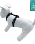 H Dog Harness - Roman Dog Harness - stuffed white dog wearing small black and gray camo dog strap harness with bold hot pink accents - against solid white background - side view - Wag Trendz