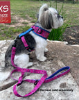 Adjustable Dog Leash - Shih Tzu mix wearing Bandana Boujee with Denim Accents in Hot Pink dog harness with adjustable leash attached - sitting on a rock outdoors - side view - Wag Trendz