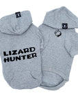 Dog Hoodie - Hoodies For Dogs - "Lizard Hunter" in gray set - back has Lizard Hunter and front has two lizards emoji making a circle - against solid white background - Wag Trendz