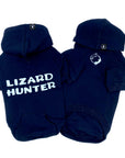 Dog Hoodie - Hoodies For Dogs - "Lizard Hunter" in black set - back has Lizard Hunter and front has two lizards emoji making a circle - against solid white background - Wag Trendz