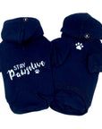 Dog Hoodie - Hoodies For Dogs - "Stay Pawsitive" dog hoodie in black set - back view Stay Pawsitive with paw print front view with paw print - against solid white background - Wag Trendz