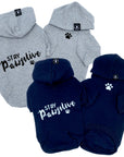 Dog Hoodie - Hoodies For Dogs - "Stay Pawsitive" dog hoodies in gray and black sets - back view Stay Pawsitive with paw print front view with paw print - against solid white background - Wag Trendz