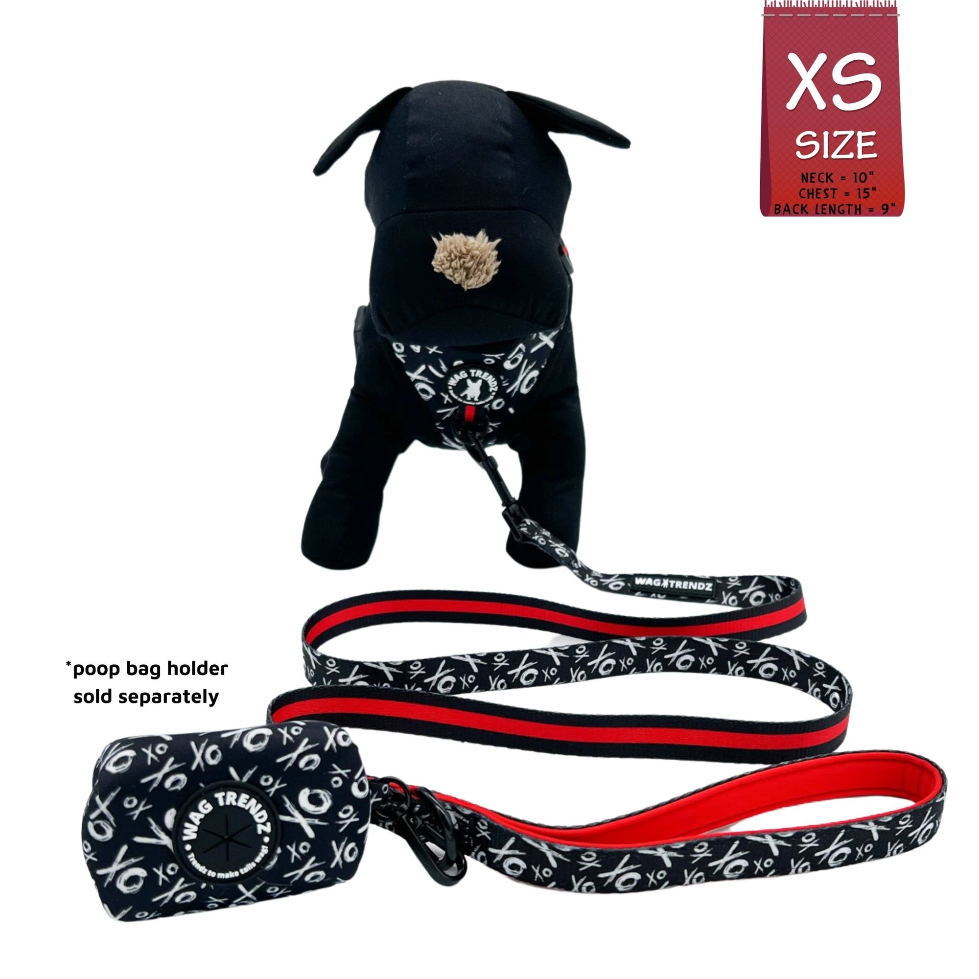 Dog Leash and Harness Set - Stuffed Black Dog wearing XS Dog Harness Vest - black and white XO&#39;s with bold red accents with matching leash and poop bag holder attached - against solid white background - Wag Trendz