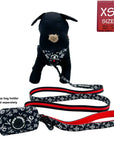 Dog Leash and Harness Set - Stuffed Black Dog wearing XS Dog Harness Vest - black and white XO's with bold red accents with matching leash and poop bag holder attached - against solid white background - Wag Trendz