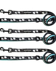 Nylon Dog Leash - three dog leashes laying in a row - black with white paint splatter and contrasting teal accents on backside of the leash laying - against a solid white background - Wag Trendz