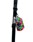 Dog Poo Bag Holder - multi-colored street graffiti hanging on solid black dog leash - against white background - Wag Trendz