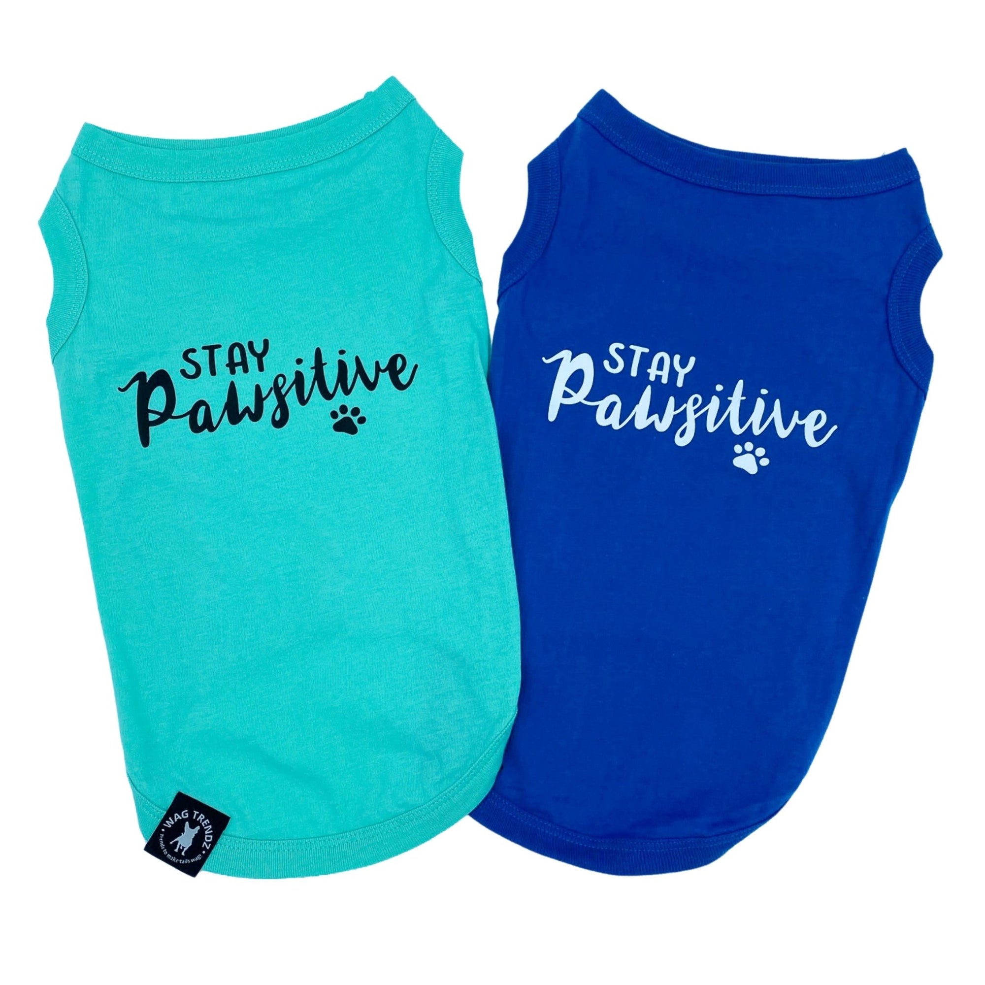 Dog T-Shirt - &quot;Stay Pawsitive&quot; - Teal and Royal Blue dog t-shirts - Stay Pawsitive lettering in black with paw print on teal t-shirt and white lettering on blue t-shirt - against solid white background - Wag Trendz